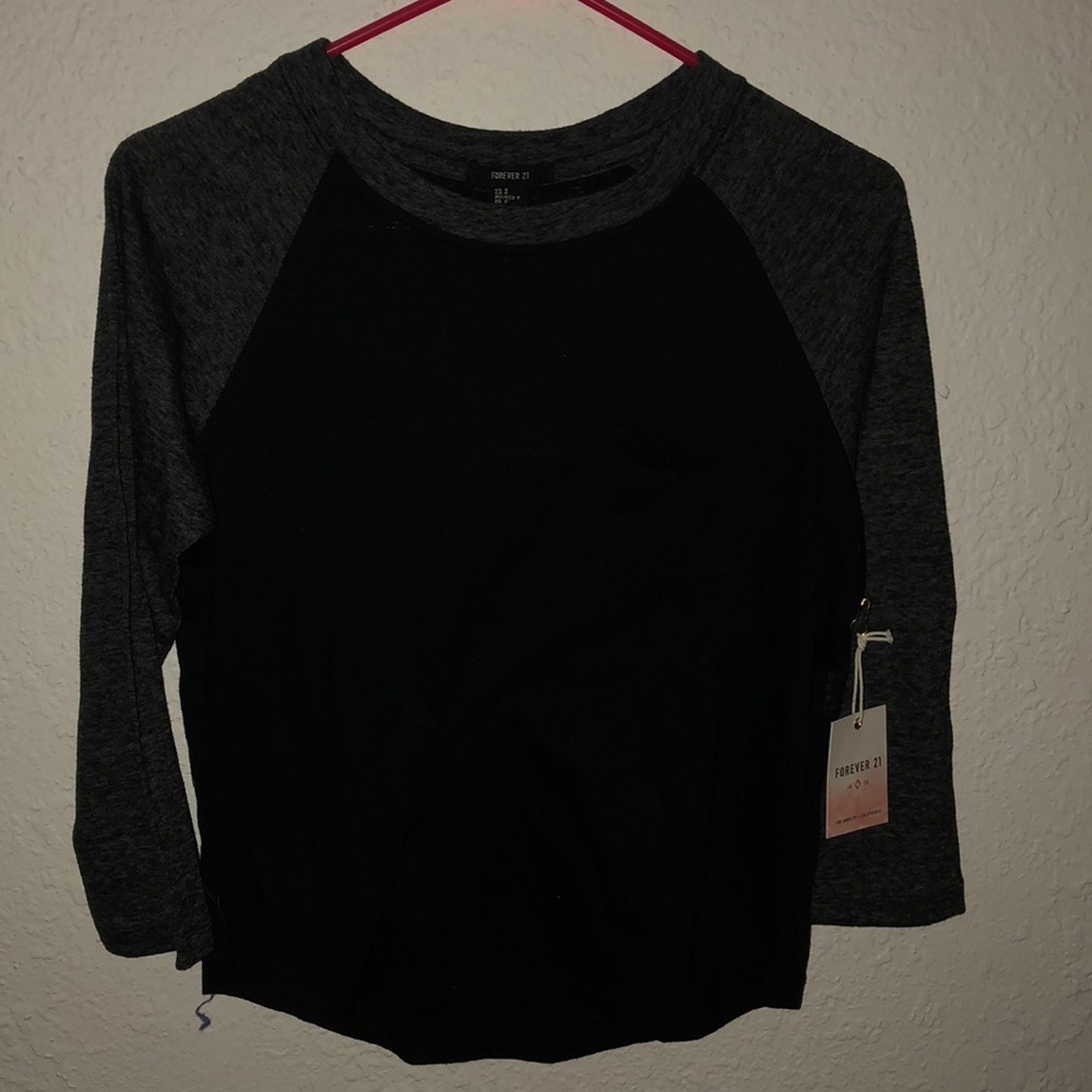 long sleeve black and gray shirt pocket on left